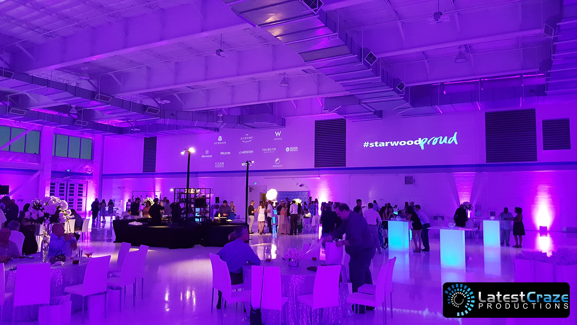 purple uplighting corporate event av logo projection hangar one scottsdale latest craze productions 061816