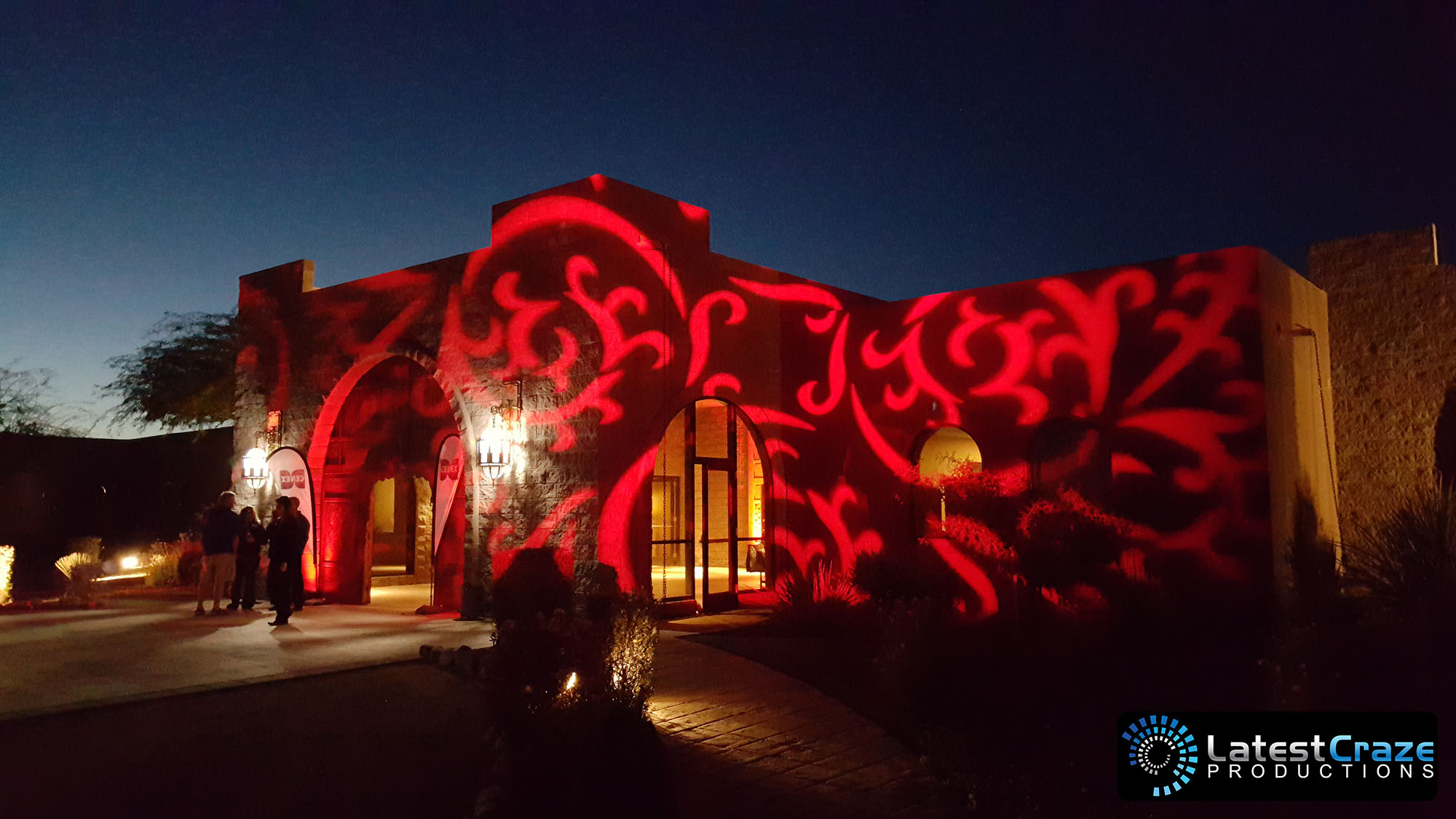 red swirl pattern gobo building outside moroccan theme scottsdale Latest Craze Productions